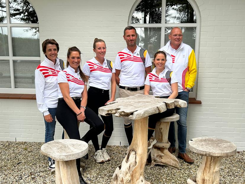Wendy Laeremans (team manager), Larissa Pauluis, Flore De Winne, Domien Michiels, Charlotte Defalque, Jeroen Van Lent (dressage manager) pose during a press moment of the BOIC-COIB to present the selection for the dressage equestrian event for the Paris Olympics, Saturday 13 July 2024 in Jabbeke.  BELGA PHOTO CHRISTIAN DETROZ