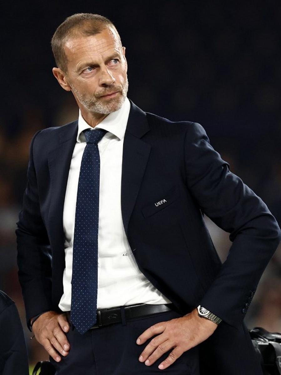 UEFA President Aleksander Ceferin looks on at the end of the UEFA Supercup football match between Champions League winners Paris Saint Germain (PSG) and Europa League winners Aston Villa in Salzburg, Austria on August 12, 2026.  FRANCK FIFE / AFP