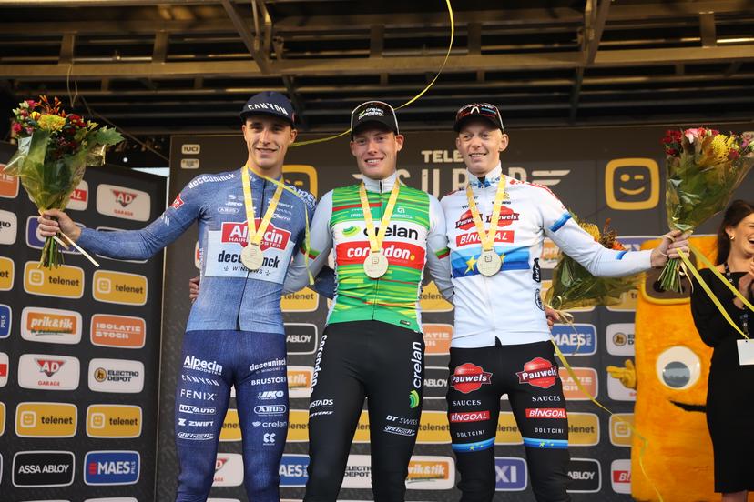 Belgian Niels Vandeputte, Belgian Joran Wyseure and Belgian Michael Vanthourenhout celebrate on the podium after the men elite race of the Cyclocross Ruddervoorde, Sunday 20 October 2024 in Oostkamp, the first stage of the Superprestige cyclocross cycling competition. BELGA PHOTO KURT DESPLENTER