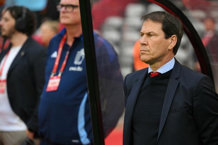 Belgium's French head coach Rudi Garcia (R) stands for the National Anthems ahead of the FIFA World Cup 2026 Group J European qualification football match between Belgium and Wales at the King Baudouin Stadium in Brussels, on June 9, 2025.  NICOLAS TUCAT / AFP