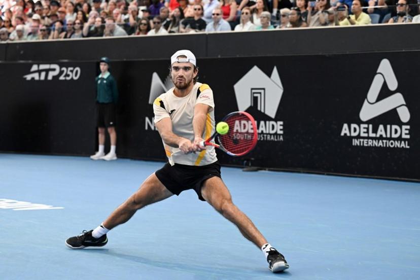 Czech Republic's Tomas Machac hits a return against France's Ugo Humbert in their men's singles final match at the Adelaide International tennis tournament in Adelaide on January 17, 2026.   Michael ERREY / AFP