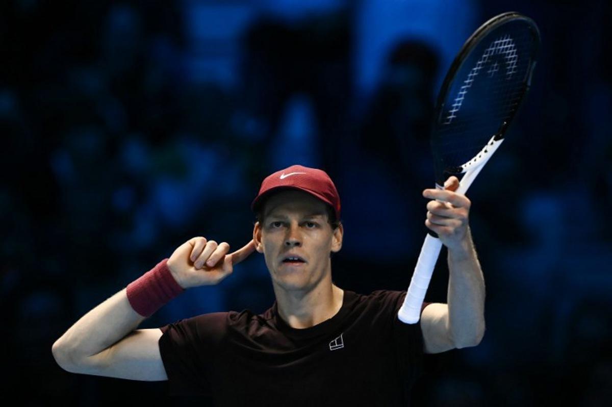 Italy's Jannik Sinner gestures during the men's single final match against Spain's Carlos Alcaraz at the ATP Finals tennis tournament, in Turin, on November 16, 2025.  Marco BERTORELLO / AFP