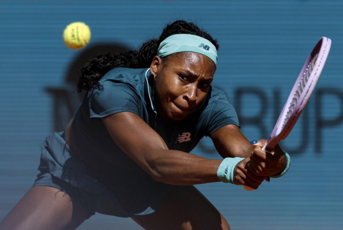 US Coco Gauff returns the ball to Romania's Sorana Cirstea during their 2026 WTA Tour Madrid Open tennis tournament singles match at the Caja Magica in Madrid, on April 26, 2026.   OSCAR DEL POZO / AFP