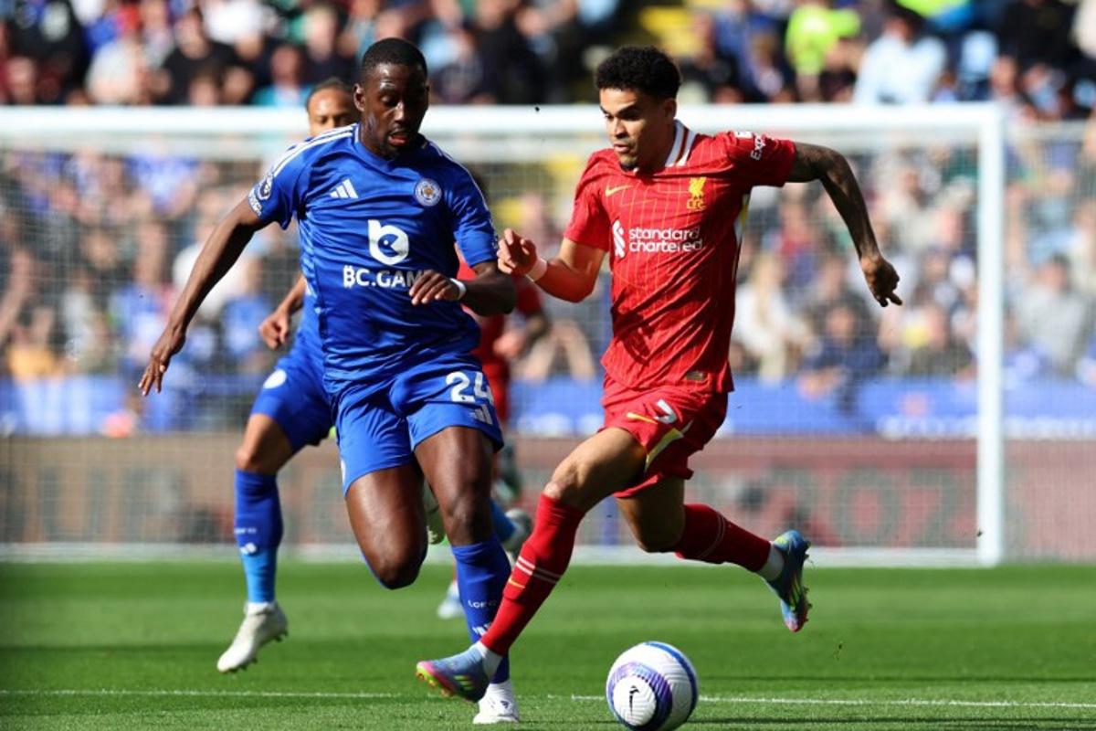 Leicester City's French midfielder #24 Boubakary Soumare (L) vies with Liverpool's Colombian midfielder #07 Luis Diaz (R) during the English Premier League football match between Leicester City and Liverpool at King Power Stadium in Leicester, central England on April 20, 2025.  Darren Staples / AFP