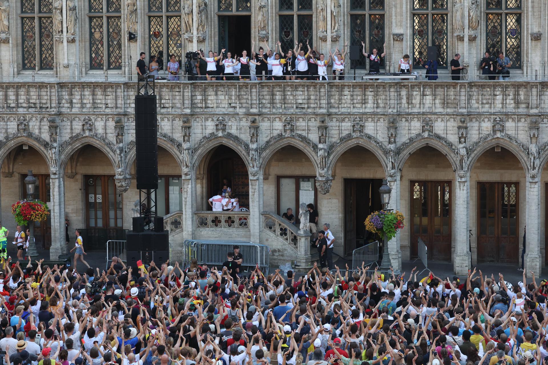 Belgian Cats' pictured during celebrations after the Paris 2024 Olympic Games, at the Grand Place - Grote Markt and the Brussels City Hall, in Brussels, on Monday 12 August 2024. The Belgian delegation at the Games of the XXXIII Olympiad counted 165 athletes competing in 21 sports. BELGA PHOTO VIRGINIE LEFOUR