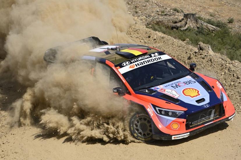 Thierry Neuville of Belgium and his co-driver Martijn Wydaeghe of Belgium compete in their Hyundai i20 during the SS9 stage of the World Rally Championship (WRC) Rally of Portugal in Mortagua, on May 16, 2025.  MIGUEL RIOPA / AFP