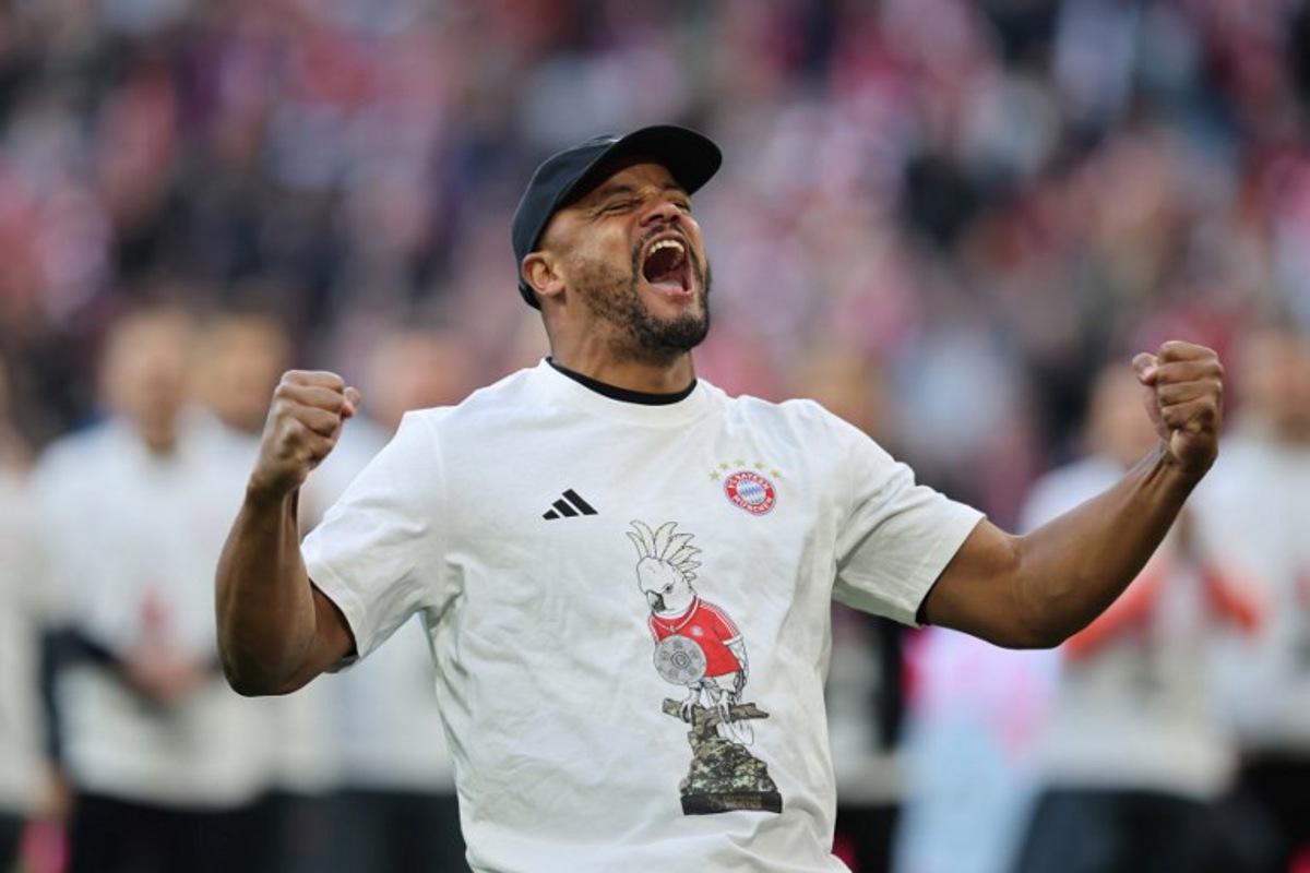 Bayern Munich's Belgian head coach Vincent Kompany celebrates after the German first division Bundesliga football match between FC Bayern Munich and VfB Stuttgart in Munich, southern Germany, on April 19, 2026. Harry Kane scored his 32nd goal of the campaign as Bayern Munich cruised to a 4-2 home win over Stuttgart and claim a record-extending 35th Bundesliga title.  Alexandra BEIER / AFP