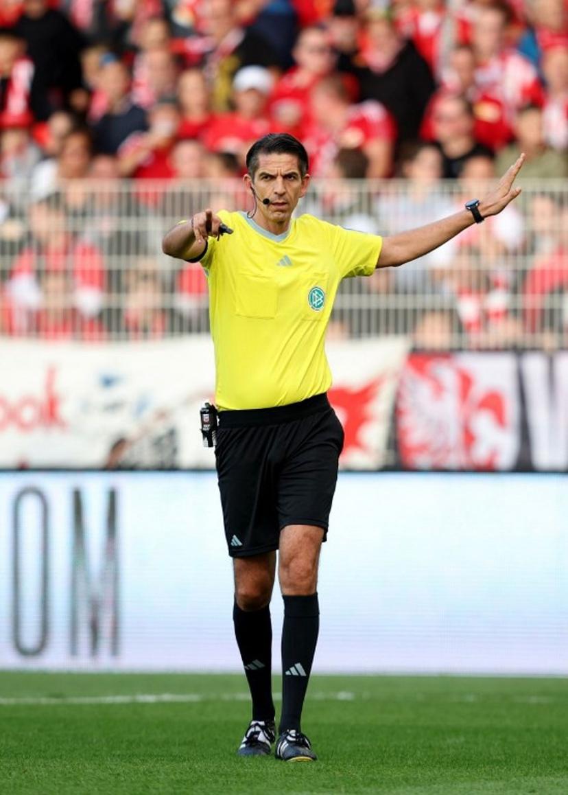 Referee Deniz Aytekin gestures during the German first division Bundesliga football match between Union Berlin and TSG 1899 Hoffenheim in Berlin, Germany, on September 23, 2023.  Ronny HARTMANN / AFP