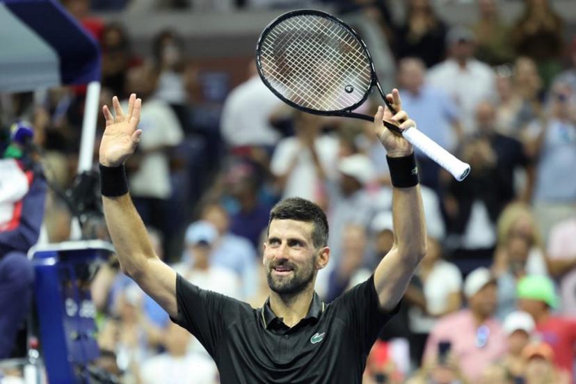 Serbia's Novak Djokovic celebrates after winning his men's singles first round tennis match against USA's Learner Tien on day one of the US Open tennis tournament at the USTA Billie Jean King National Tennis Center in New York City, on August 24, 2025.  CHARLY TRIBALLEAU / AFP