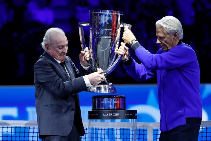 Team Europe's captain and Swedish former tennis player Bjorn Borg (R) and Australian former tennis player Rod Laver lift the trophy during the awarding ceremony at the end of the 2024 Laver Cup tennis tournament in Berlin, Germany on September 22, 2024. Spain's Carlos Alcaraz won the last match of the tournament 6-2, 7-5 against USA's Taylor Fritz of Team World. Team Europe won 13-11 against Team World.  Odd ANDERSEN / AFP