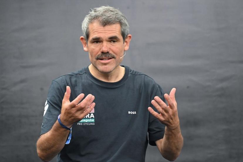 Ralph Denk, team manager, speaks during the presentation of the new Red Bull-Bora-Hansgrohe cycling team in Salzburg, Austria, on June 26, 2024. Red Bull on June 26, 2024 unveiled its eight-rider cycling team to debut in this week's Tour de France, marking the energy drink maker's latest expansion of its sports empire. Earlier this year, Red Bull bought a controlling stake in the German Bora-Hansgrohe cycling team.  KERSTIN JOENSSON / AFP