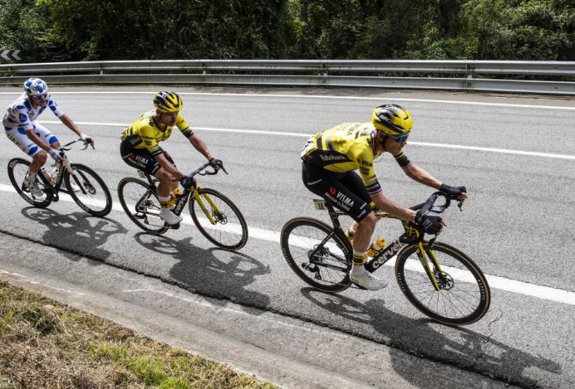 Team Visma-Lease a bike's Dutch rider Dylan van Baarle (R), Team Visma-Lease a bike's Belgian rider Victor Campenaerts (C) and Team UAE's Australian rider Jay Vine ride during the eleventh stage of the Vuelta a Espana cycling tour, a 167 km race from Bilbao to Bilbao, on September 3, 2025.  ANDER GILLENEA / AFP