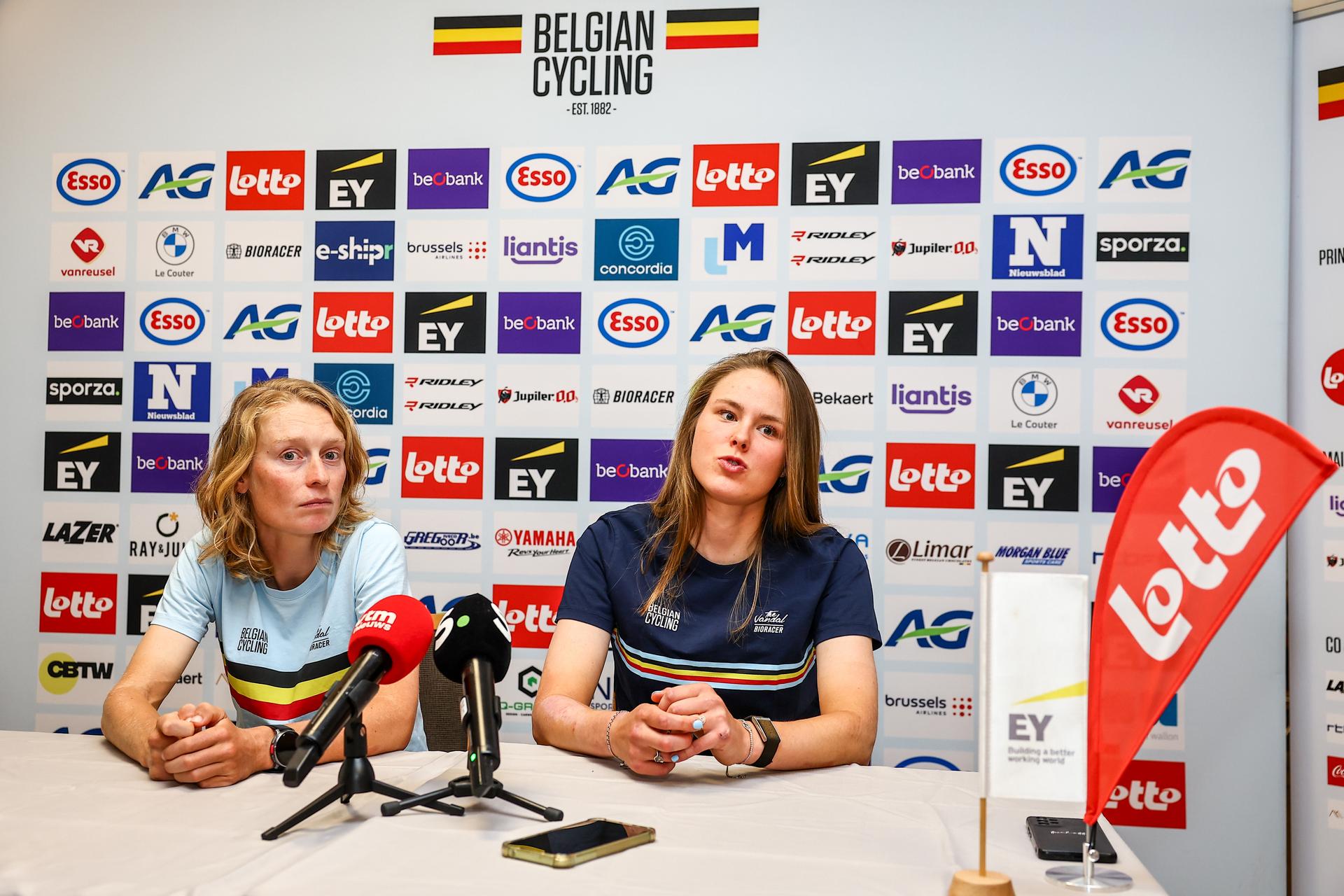 Belgian Lotte Claes of Arkea - B&B Hotels Women and Belgian Julie De Wilde of Fenix-Deceuninck pictured during a press conference ahead of the start of the UEC road European cycling championships, Tuesday 30 September 2025, in Loriol-sur-Drome, France. The European cycling championships take place from 1 to 5 October in Drome and Ardeche, France. BELGA PHOTO DAVID PINTENS