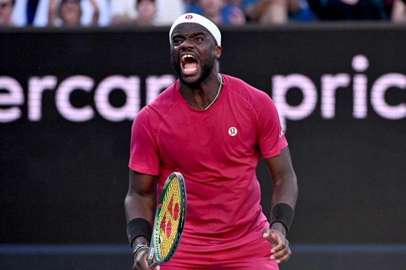 Hungary's Fabian Marozsan reacts on a point against USA's Frances Tiafoe during their men's singles match on day five of the Australian Open tennis tournament in Melbourne on January 16, 2025.  WILLIAM WEST / AFP
