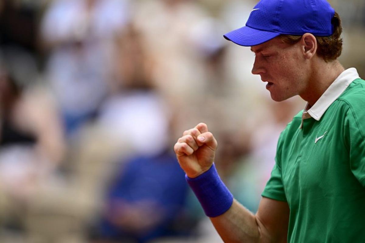 Italy's Jannik Sinner reacts after a point during his men's singles match against Czech Republic's Jiri Lehecka on day 7 of the French Open tennis tournament on Court Philippe-Chatrier at the Roland-Garros Complex in Paris on May 31, 2025.  JULIEN DE ROSA / AFP