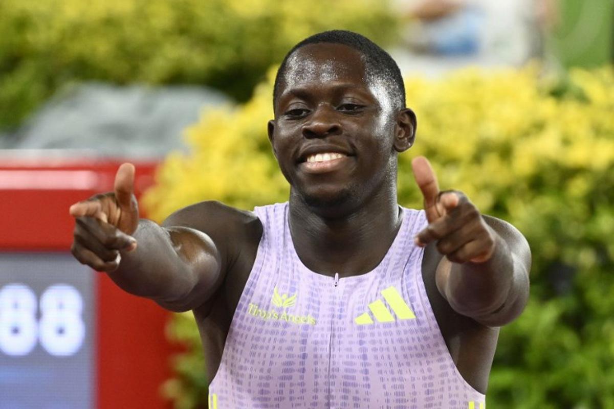 Jamaica's Oblique Seville celebrates after winning the men's 100m during the Diamond League athletics meeting at the Stade Louis II in Monaco on July 10, 2026.  Frederic DIDES / AFP