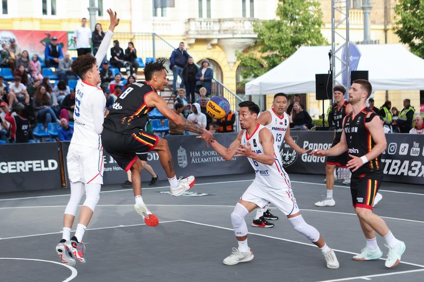 Belgian Dennis Donkor and Mongolia's Dulguun Enkhbat are pictured in action during a game between Belgium and Moldavia in the group D, at the Olympic qualification tournament for the 2024 Olympics, in Debrecen, Hungary, Friday 17 May 2024. BELGA PHOTO NIKOLA KRSTIC