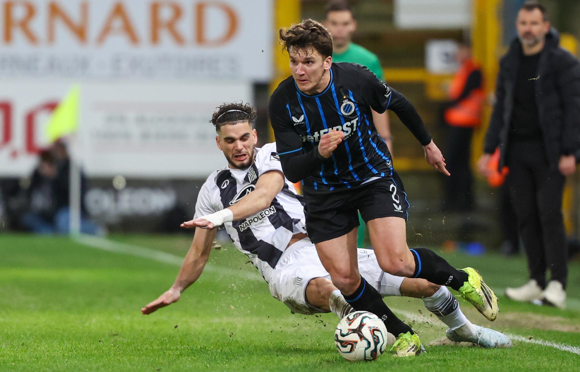Charleroi's Kevin Van Den Kerkhof and Club's Christos Tzolis fight for the ball during a soccer match between Sporting Charleroi and Club Brugge KV, Sunday 01 March 2026 in Charleroi, on day 27 of the 2025-2026 'Jupiler Pro League' first division of the Belgian championship. BELGA PHOTO VIRGINIE LEFOUR