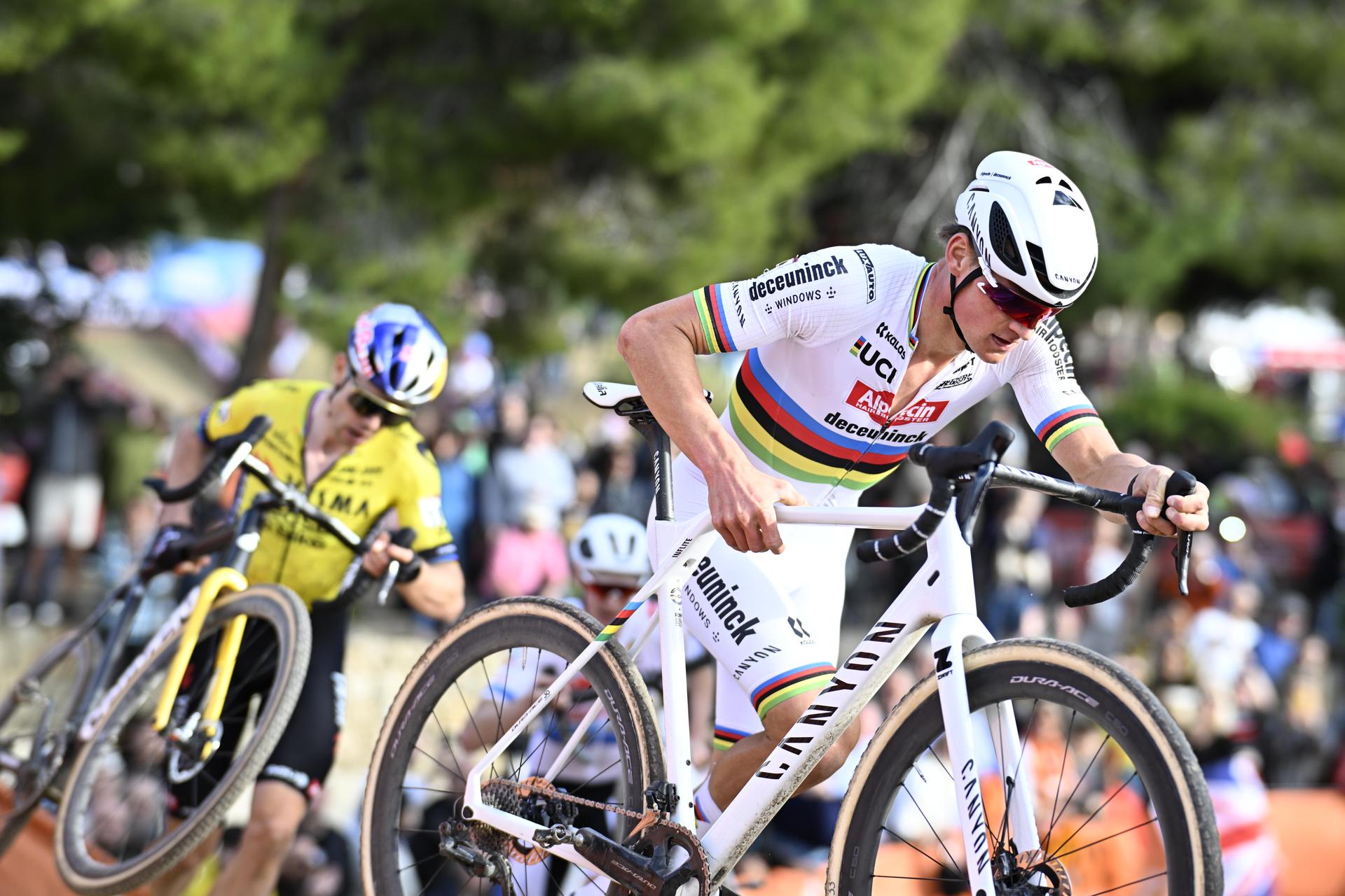 Belgian Wout van Aert and Dutch Mathieu Van Der Poel pictured in action during the men's elite race at the cyclocross cycling event in Benidorm, Spain, Sunday 21 January 2024, stage 13/14 in the World Cup ranking. BELGA PHOTO JASPER JACOBS