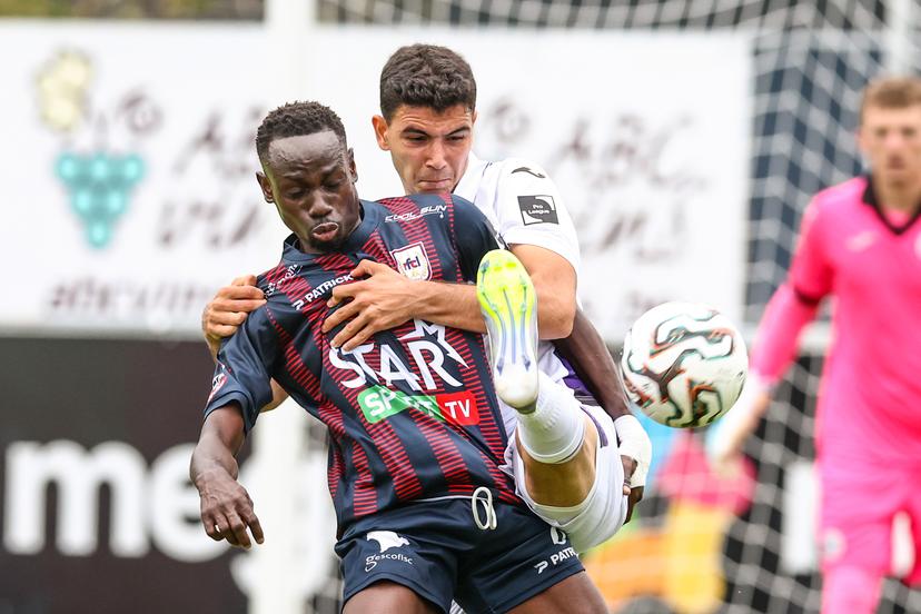 Liege's Oumar Diouf and RSCA Futures' Yasin Ozcan fight for the ball during a soccer game between RFC Liege vs RSCA Futures, Saturday 20 September 2025 in Liege, on day 6 of the 2025-2026 'Challenger Pro League' 1B second division of the Belgian championship. BELGA PHOTO BRUNO FAHY
