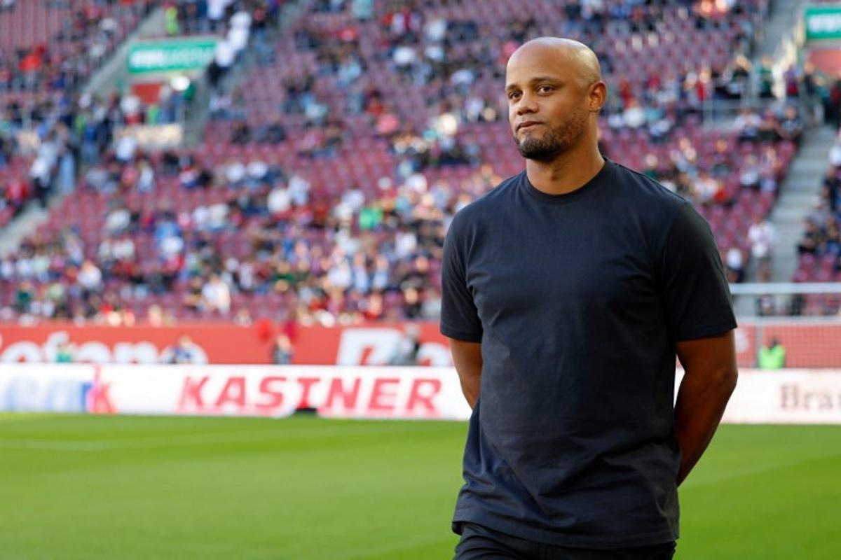 Bayern Munich's Belgian head coach Vincent Kompany arrives for the German first division Bundesliga football match between FC Augsburg and FC Bayern Munich in Augsburg, southern Germany, on August 30, 2025.  Michaela STACHE / AFP
