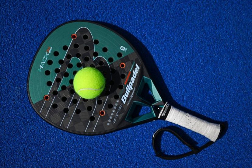This photograph shows a padel tennis raquet at the Beziers Indoor Padel club in Beziers, southern France on July 22, 2025. The padel, a mixture of tennis and squash, is played in teams of two on a court that is typically surrounded by glass walls which players can bounce balls off. GABRIEL BOUYS / AFP