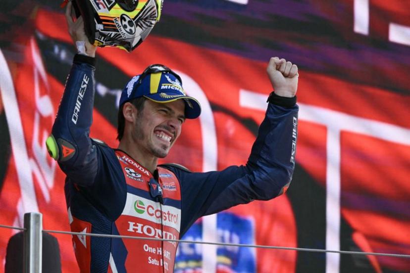 Team Repsol Honda Team's Joan Mir celebrates on the podium after finishing in second place at the 2026 Catalunya Moto GP Grand Prix at the Catalunya racetrack in Montmelo, near Barcelona, on May 17, 2026.  JOSE JORDAN / AFP