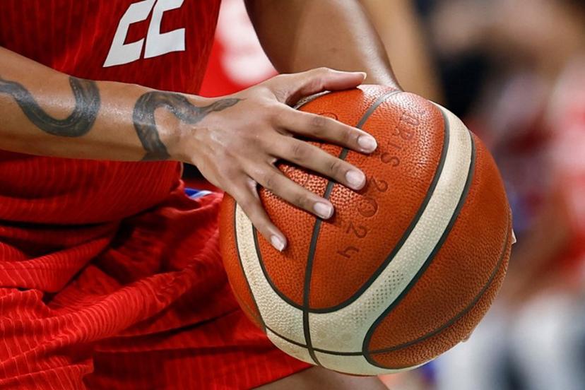 Puerto Rico's #22 Arella Guirantes holds the ball in the women's preliminary round group A basketball match between China and Puerto Rico during the Paris 2024 Olympic Games at the Pierre-Mauroy stadium in Villeneuve-d'Ascq, northern France, on August 3, 2024.  Sameer Al-Doumy / AFP