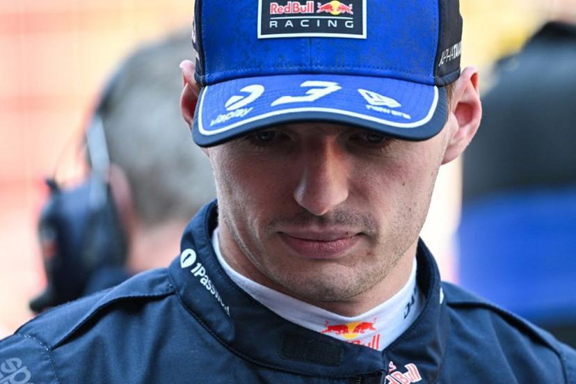 Red Bull Racing's Dutch driver Max Verstappen is pictured in the pit stop before the start of the sprint race ahead of the Formula One Chinese Grand Prix at the Shanghai International Circuit in Shanghai on March 14, 2026.  Hector RETAMAL / AFP
