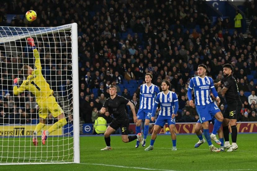 Brighton's Dutch goalkeeper #01 Bart Verbruggen makes a save during the English Premier League football match between Brighton and Hove Albion and Sunderland at the American Express Community Stadium in Brighton, southern England on December 20, 2025.  Glyn KIRK / AFP