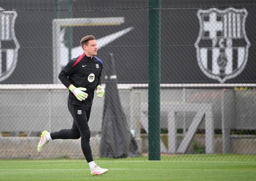 Barcelona's German goalkeeper #01 Marc-Andre Ter Stegen takes part in a training session on the eve of the Spanish league football match between FC Barcelona and Real Madrid CF, at the Joan Gamper training ground in Sant Joan Despi, near Barcelona, on May 10, 2025.  Josep LAGO / AFP