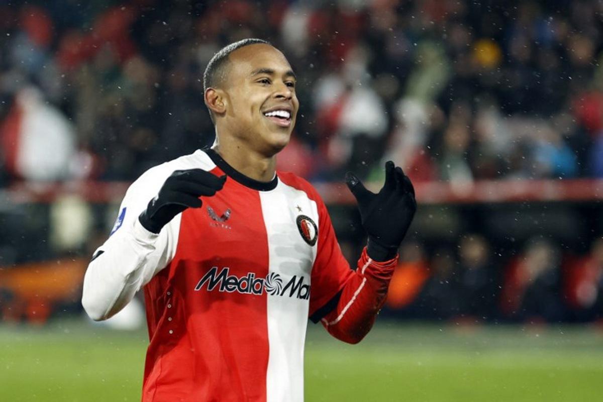 Feyenoord's Brazilian forward #14 Igor Paixao celebrates scoring his team's thrid goal during the Dutch Eredivisie football match between Feyenoord and SC Heerenveen at the Feyenoord "De Kuip" stadium in Rotterdam, on November 23, 2024.  MAURICE VAN STEEN / ANP / AFP