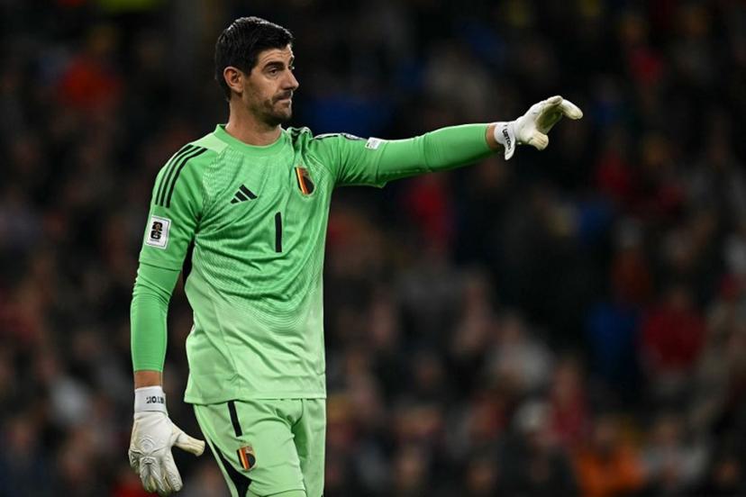 Belgium's goalkeeper #01 Thibaut Courtois shouts instructions to team mates during the 2026 World Cup Group J qualifier football match between Wales and Belgium, at Cardiff City Stadium, in Cardiff, on October 13, 2025.   Paul ELLIS / AFP