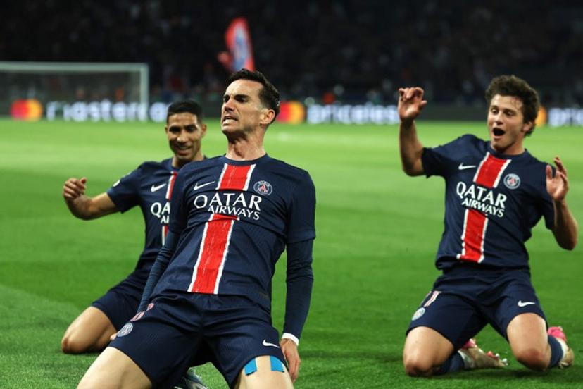 Paris Saint-Germain's Spanish midfielder #08 Fabian Ruiz (C) celebrates with his teammates Paris Saint-Germain's Moroccan defender #02 Achraf Hakimi (L) and Paris Saint-Germain's Portuguese midfielder #87 Joao Pedro Goncalves Neves (R) after scoring his team's first goal during the UEFA Champions League semi-final second leg football match between Paris Saint-Germain (PSG) and Arsenal at the Parc des Princes stadium in Paris, on May 7, 2025.  Thomas SAMSON / AFP