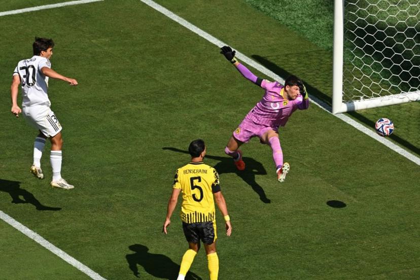 Real Madrid's Spanish forward #30 Gonzalo Garcia scores his team's first goal  during the FIFA Club World Cup 2025 quarterfinal football match between Spain's Real Madrid and Germany's Borussia Dortmund at the MetLife stadium in East Rutherford, New Jersey on July 05, 2025.  ANGELA WEISS / AFP