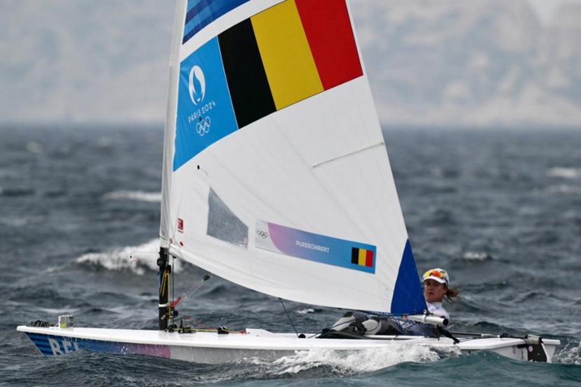 Belgium's Emma Plasschaert competes in the medal race of the women's ILCA 6 single-handed dinghy event during the Paris 2024 Olympic Games sailing competition at the Roucas-Blanc Marina in Marseille on August 7, 2024.   Christophe SIMON / AFP
