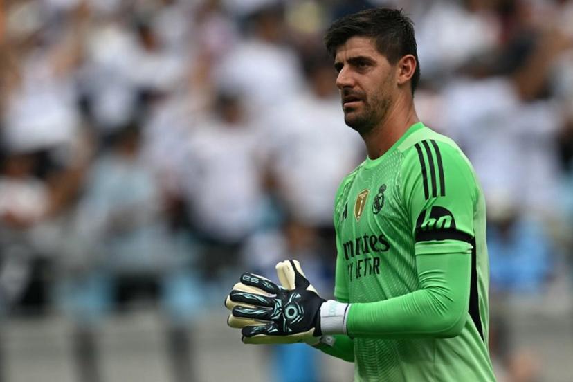 Real Madrid's Belgian goalkeeper #01 Thibaut Courtois reacts after his team's first goal during the FIFA Club World Cup 2025 Group H football match between Spain's Real Madrid and Mexico's Pachuca at the Bank of America stadium in Charlotte on June 22, 2025.  Paul ELLIS / AFP