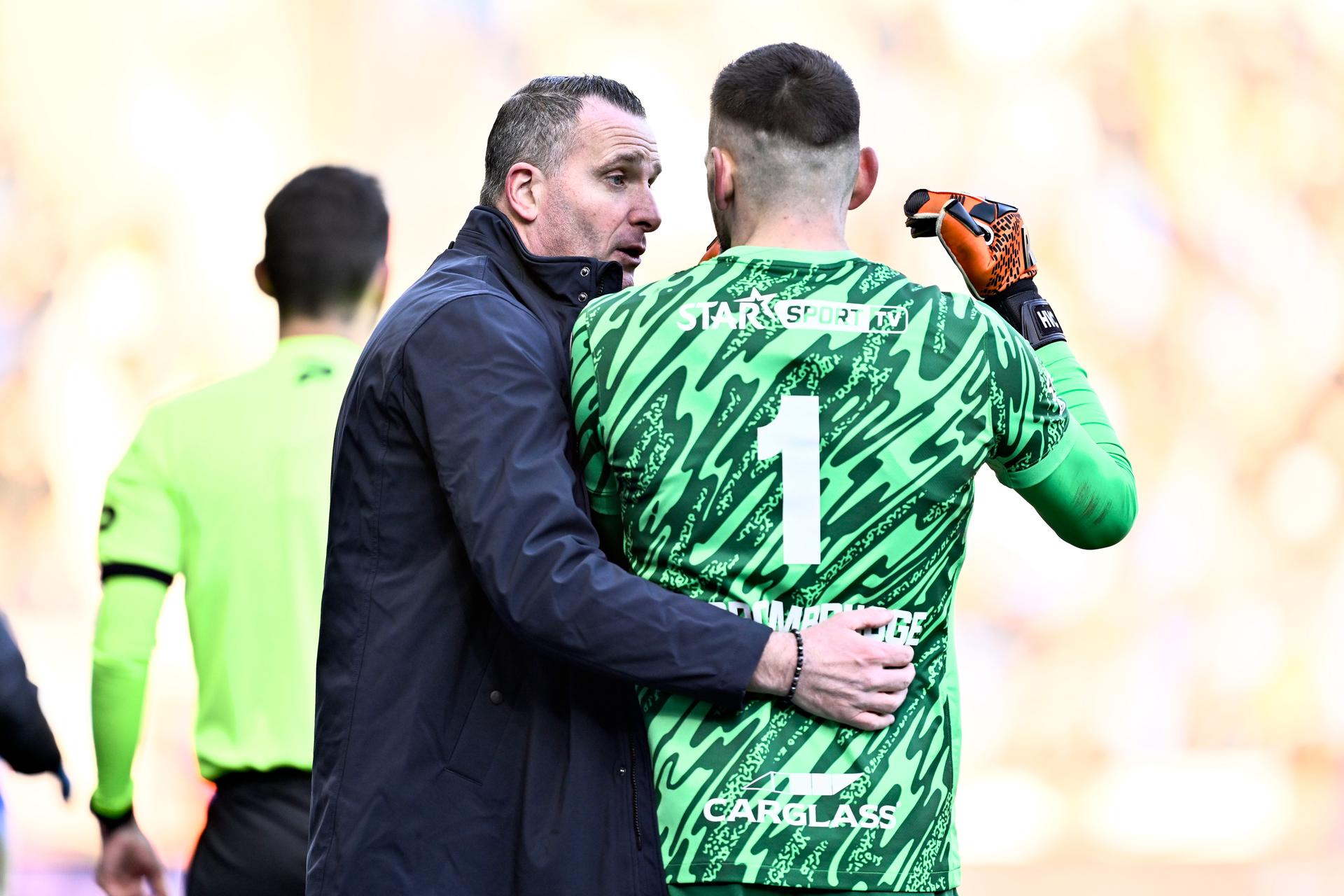 Genk's head coach Nicky Hayen and Genk's goalkeeper Hendrik Van Crombrugge pictured during a soccer match between KRC Genk and Club Brugge, Friday 26 December 2025 in Genk, a game of day 20 of the 2025-2026 'Jupiler Pro League' first division of the Belgian championship. BELGA PHOTO JOHAN EYCKENS
