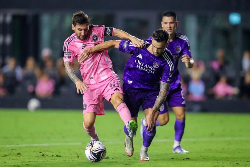 Inter Miami's Argentine forward #10 Lionel Messi fights for the ball with Orlando City's Slovenian defender #04 David Brekalo during the Leagues Cup semi-final football match between Inter Miami CF and Orlando City SC at Chase Stadium in Fort Lauderdale, Florida, on August 27, 2025.  Chris Arjoon / AFP