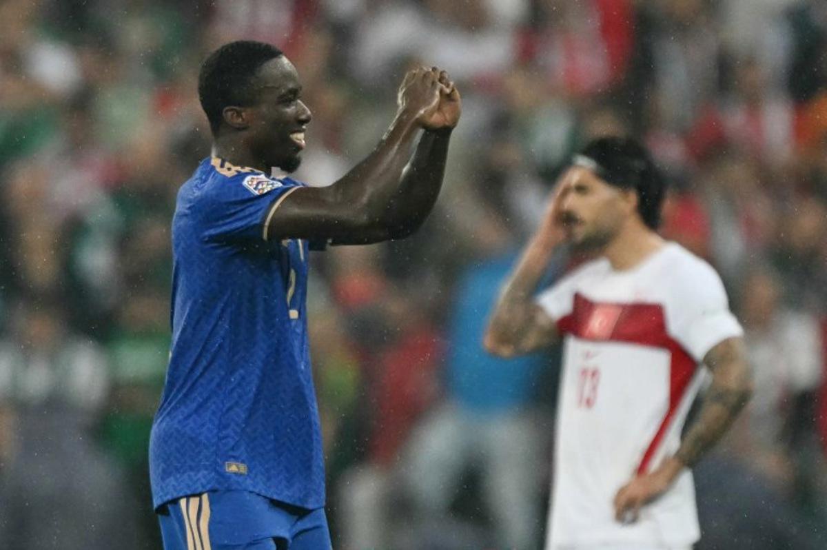 Italy's defender #02 Michael Kayode celebrates scoring his team's third goal during the UEFA Nations League football match (League A, Group A1) between Turkey and Italy at the Ataturk Sports Complex Matlı Stadium in Bursa on September 28, 2026.  OZAN KOSE / AFP