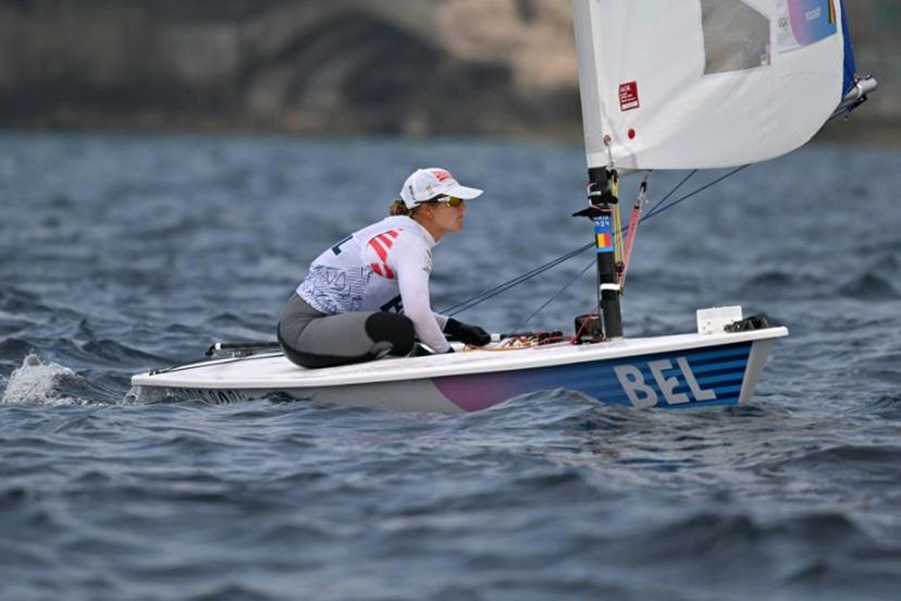 Belgium's Emma Plasschaert prepares for the medal race of the women's ILCA 6 single-handed dinghy event during the Paris 2024 Olympic Games sailing competition at the Roucas-Blanc Marina in Marseille on August 7, 2024.   NICOLAS TUCAT / AFP