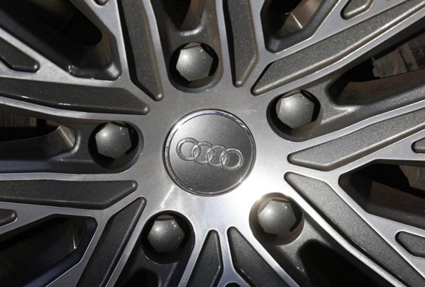 The logo of German carmaker Audi is seen on the wheel rim of a car, on January 21, 2021 in Berlin.  Odd ANDERSEN / AFP