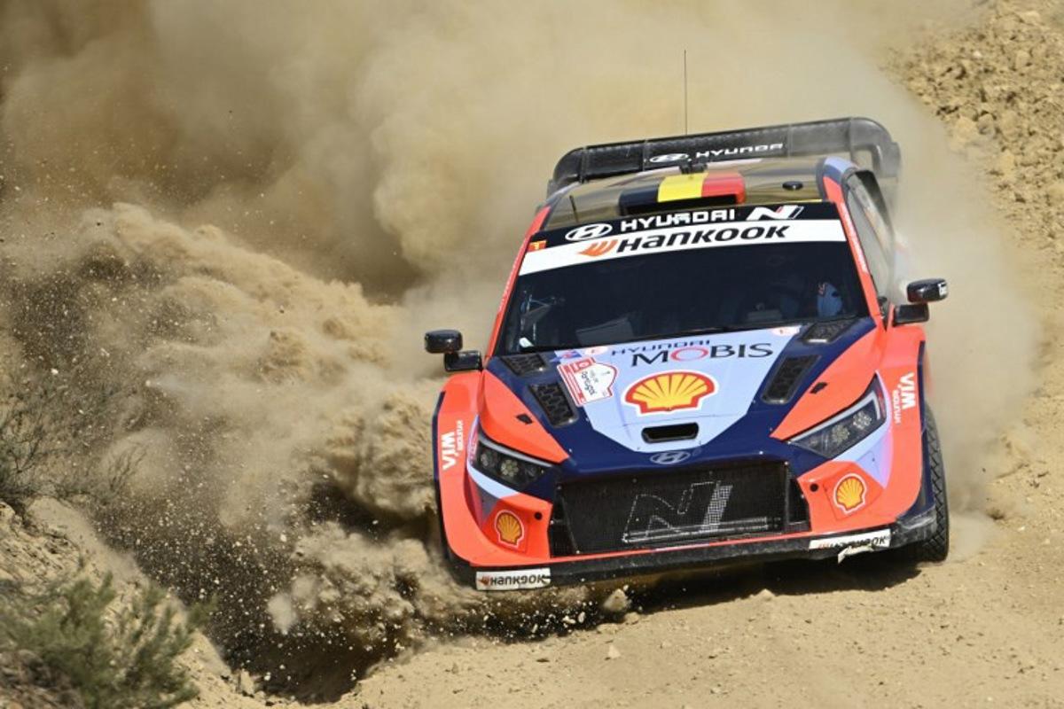 Thierry Neuville of Belgium and his co-driver Martijn Wydaeghe of Belgium compete in their Hyundai i20 during the SS9 stage of the World Rally Championship (WRC) Rally of Portugal in Mortagua, on May 16, 2025.  MIGUEL RIOPA / AFP