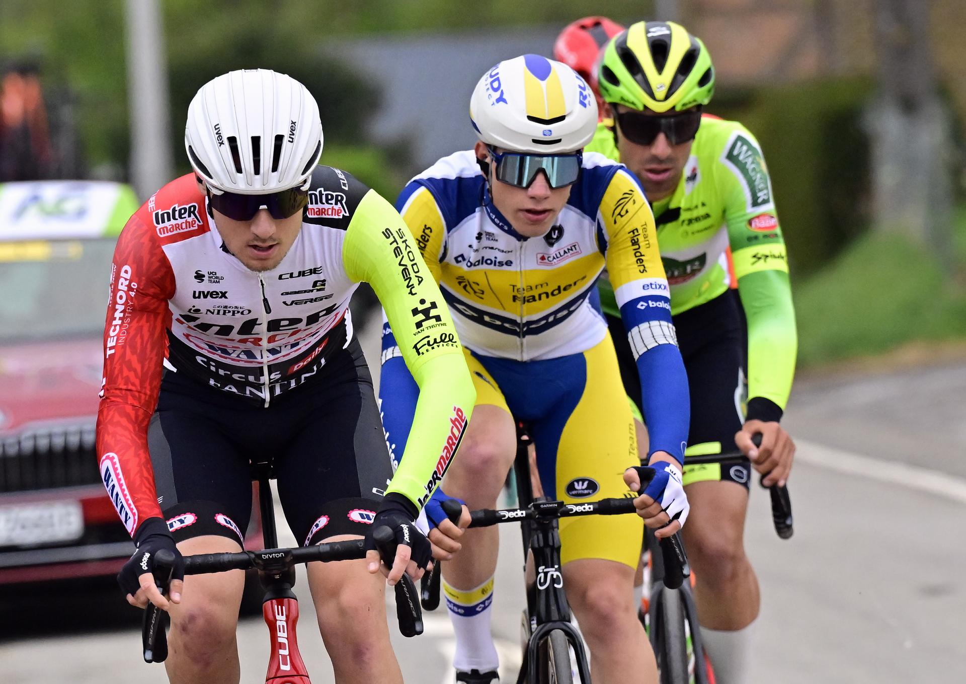 Belgian Tom Paquot of Intermarche-Wanty, Belgian Siebe Deweirdt of Team Flanders Baloise, Belgian Ceriel Desal of Wagner Bazin WB, French Simon Guglielmi of Arkea-BB Hotels and American Artem Shmidt of Ineos Grenadiers pictured in action during the men's race of the 'La Fleche Wallonne', one day cycling race (Waalse Pijl - Walloon Arrow), 205,2 km from Ciney to Huy, Wednesday 23 April 2025. BELGA PHOTO DIRK WAEM
