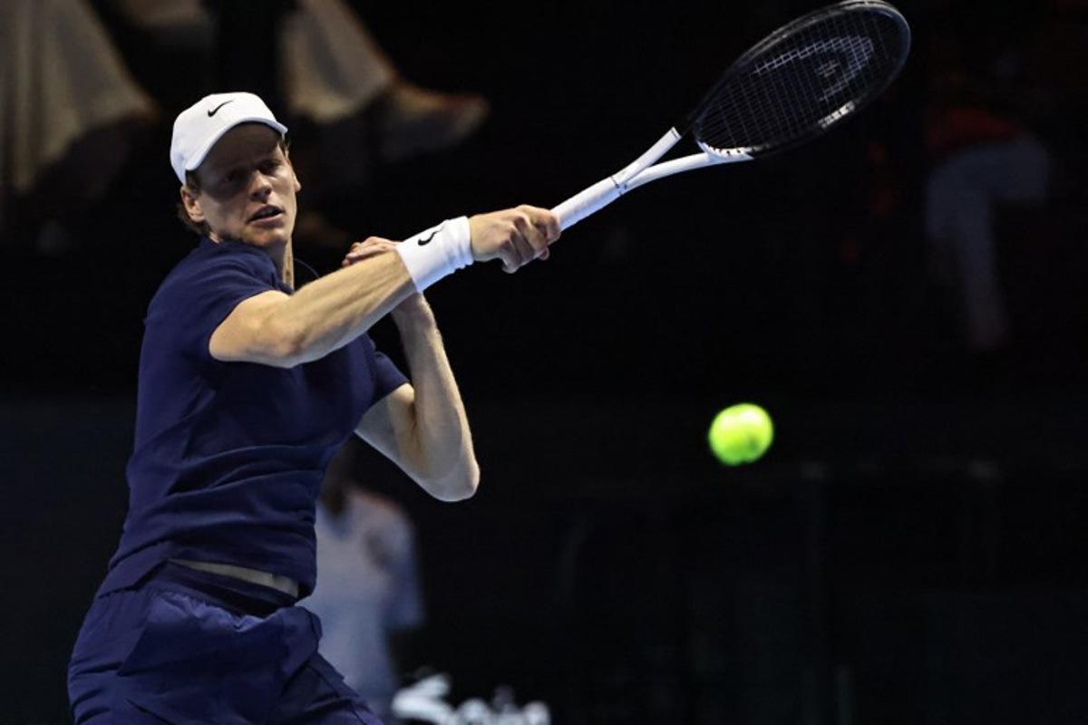 Italy's Jannik Sinner hits a return against Spain's Carlos Alcaraz during the final the Six Kings Slam exhibition tennis tournament in Riyadh on October 18, 2025.  Fayez NURELDINE / AFP