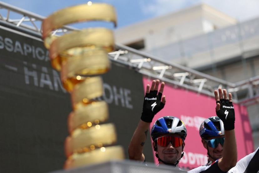 Red Bull-Bora-Hansgrohe's Slovenian rider Primoz Roglic waves at the crowd during the ceremony ahead of the start of the 5th stage of the 108th Giro d'Italia cycling race 151kms from Ceglie Messapica to Matera on May 14, 2025.  Luca Bettini / AFP