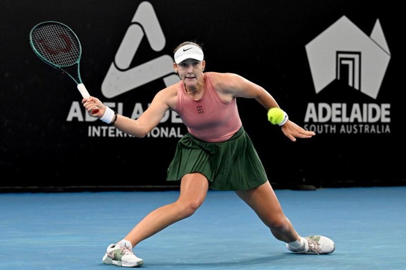 Russia's Mirra Andreeva hits a return to her compatriot Diana Shnaider during their women's singles semi-final match at the Adelaide International tennis tournament in Adelaide on January 16, 2026.  Michael ERREY / AFP