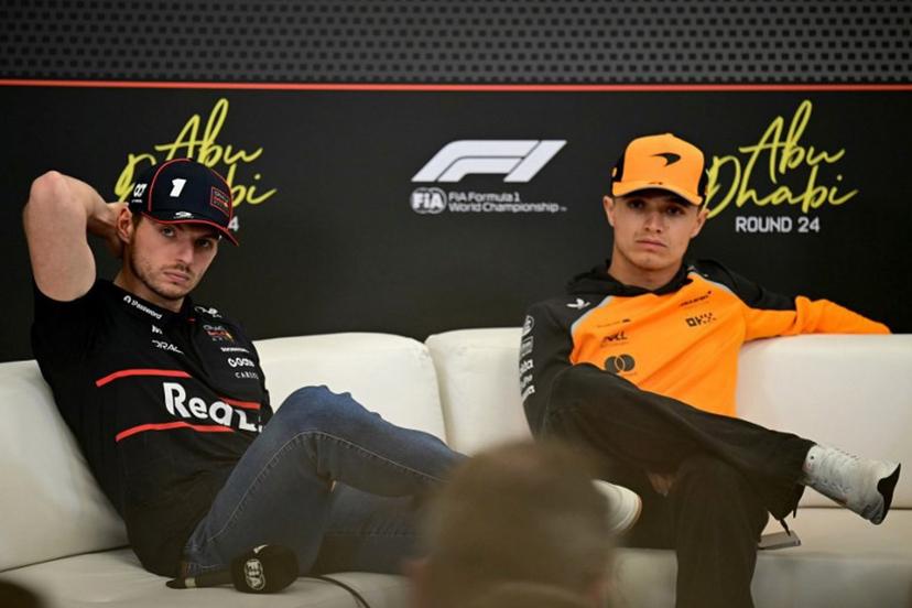 Red Bull Racing's Dutch driver Max Verstappen (L) and McLaren's British driver Lando Norris attend a press conference ahead of the Abu Dhabi Formula One Grand Prix at the Yas Marina Circuit in Abu Dhabi on December 4, 2025.  Giuseppe CACACE / AFP