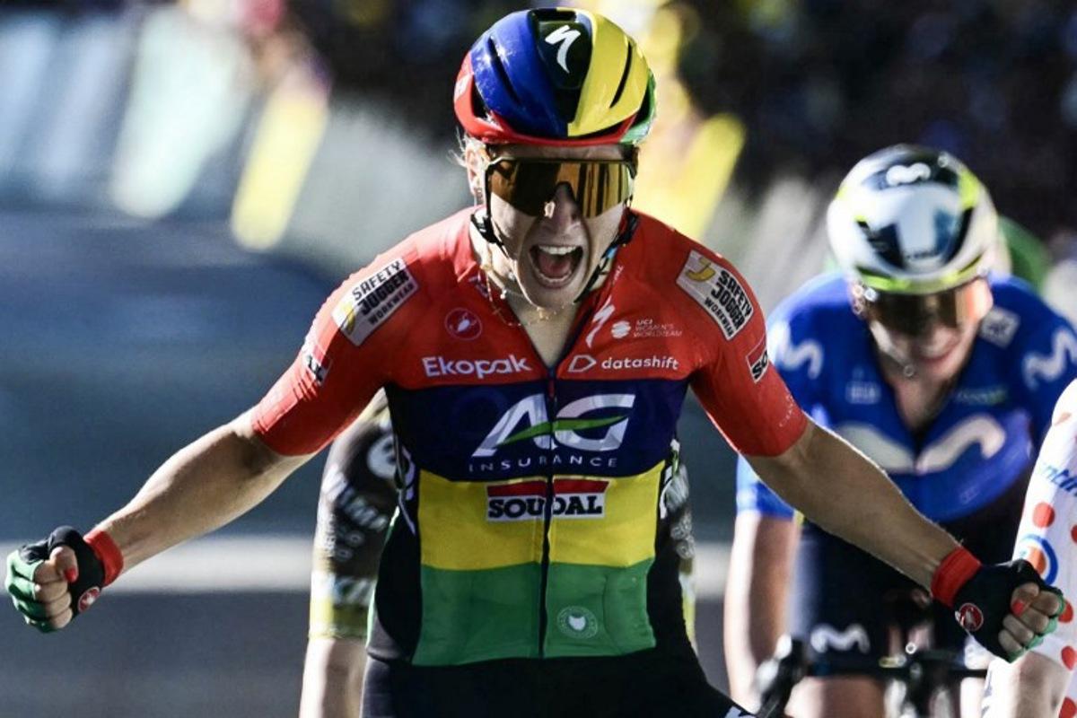 AG Insurance-Soudal Team's Mauritian rider Kim Le Court-Pienaar celebrates as she crosses the finish line to win the 6th (out of 9) stage of the fifth edition of the Women's Tour de France cycling race, 153.4 km from Montbrison to Tournon-sur-Rhone, in Tournon-sur-Rhone, central-eastern France on August 6, 2026.  NICOLAS TUCAT / AFP