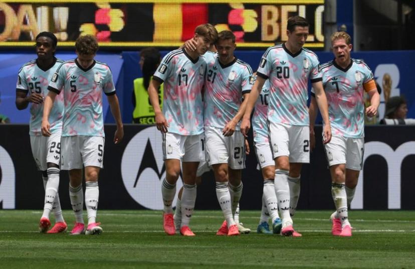 Belgium's forward #17 Charles De Ketelaere celebrates scoring his team's first goal with teammates during the 2026 World Cup football tournament quarter-final match between Spain and Belgium at the Los Angeles Stadium in Inglewood on July 10, 2026.   Patrick T. Fallon / AFP